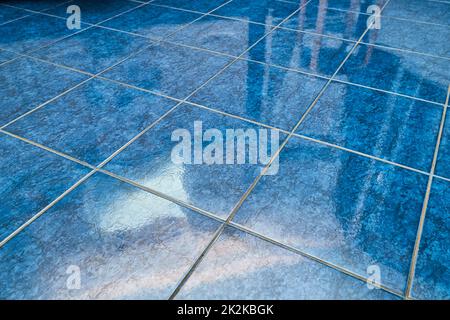 Tiled bathroom floor Stock Photo