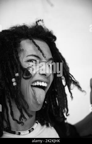 Rasta hair singer performing live on stage Stock Photo