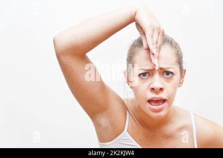 young woman gesture for you are crazy Stock Photo