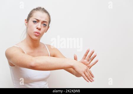 woman performing gesture for AWAY FROM ME Stock Photo