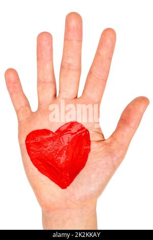 Hand with painted red heart Stock Photo