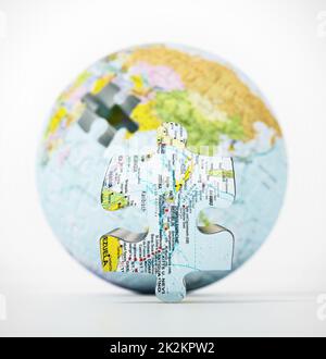 3D globe with world map consisting of puzzle parts isolated on white background. 3D illustration Stock Photo