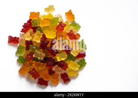 a bunch of colorful gummy bears on a white background Stock Photo