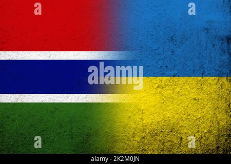 The Republic of The Gambia National flag with National flag of Ukraine. Grunge background Stock Photo