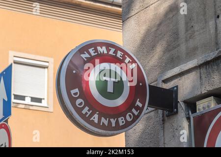 Debrecen, Hungary - June 11, 2022: Emblem of Nemzeti Dohanybolt shop in Hungary. Stock Photo
