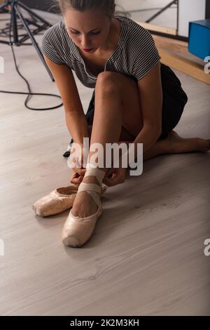 ballerina means female ballet dancer Stock Photo