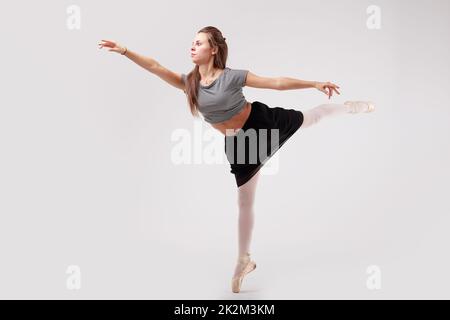 ballerina means female ballet dancer Stock Photo