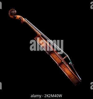 side view of a baroque violin on black Stock Photo