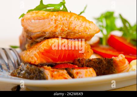 grilled samon filet with vegetables salad Stock Photo