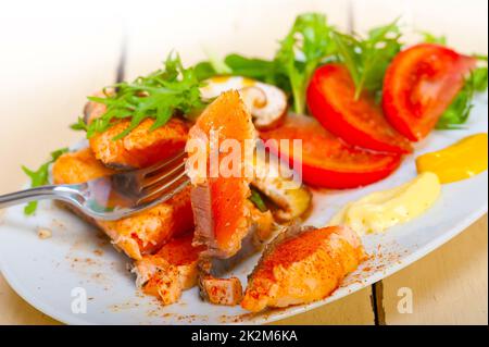 grilled samon filet with vegetables salad Stock Photo