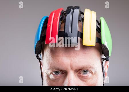 close up of a bike helmet on an old man Stock Photo