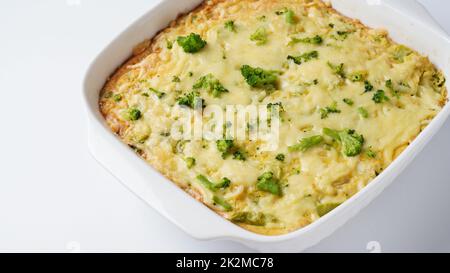 Casserole with cheese and broccoli. Broccoli gratin with melted cheese Stock Photo