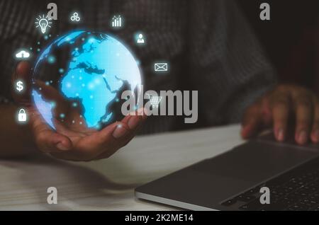 Man hand virtual world icon. Communication and use of modern Internet technology  Social Networking online marketing digital online.Business metaverse concept technology. Stock Photo