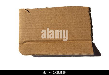 A piece of corrugated cardboard insulated on a white background. Cardboard texture with a ragged edge Stock Photo