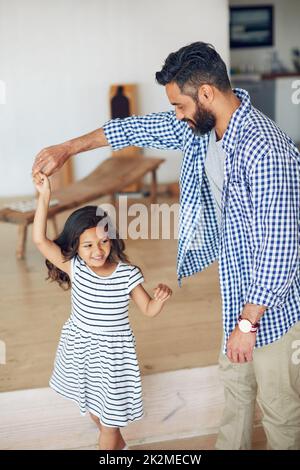 These are the moments that make life so much fun. Cropped shot of a father and daughter having fun together at home. Stock Photo