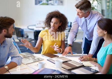 Getting her point across. Cropped shot of a business meeting in progress. Stock Photo