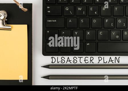 Text showing inspiration Disaster Plan. Concept meaning Respond to Emergency Preparedness Survival and First Aid Kit Computer Keyboard And Symbol.Information Medium For Communication. Stock Photo