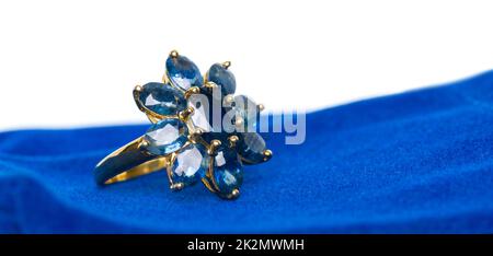 Blue Sapphire Jewel or gems ring on velvet bag. Collection of natural gemstones accessories. Studio shot Stock Photo