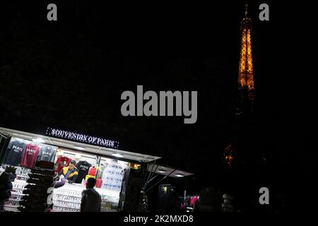 Paris, France. 22nd Sep, 2022. The lighting Eiffel Tower is seen in Paris, France, Sept. 22, 2022. Lights will be switched off at the Eiffel Tower at 23:45, as soon as the last tourist leaves, instead of the current 1:00 from Sept. 23 in order to help save energy. Credit: Gao Jing/Xinhua/Alamy Live News Stock Photo