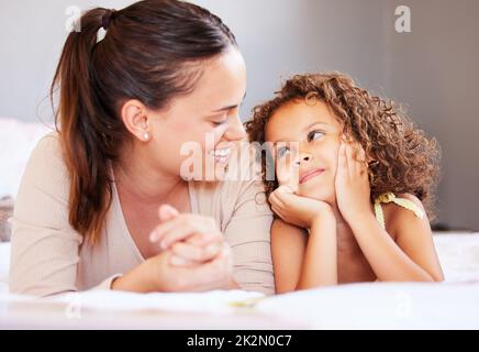 I want to keep you this young forever. Shot of a young mother spending time with her daughter. Stock Photo
