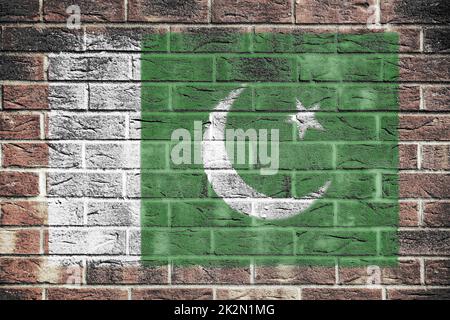 Pakistan flag on old brick wall background Stock Photo