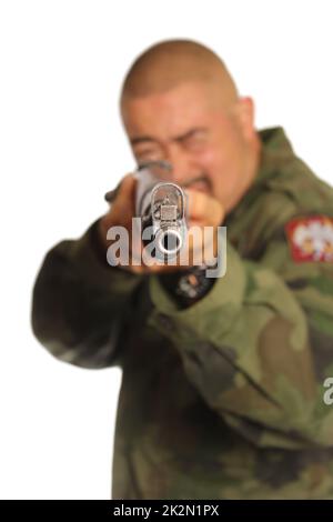 Man Wearing Camouflage Holding a Gun Isolated on White Background Stock Photo