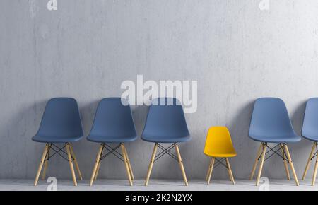 row of chairs in the waiting room, one is much smaller. Stock Photo