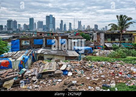 View of Mumbai skyline over slums in Bandra suburb Stock Photo