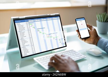 Scheduling Plan Using Cloud Software Stock Photo
