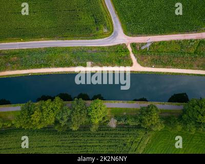 canal Dessel Schoten aerial photo in Rijkevorsel, kempen, Belgium, showing the waterway in the natural green agricultural landscape. High quality photo. High quality photo Stock Photo