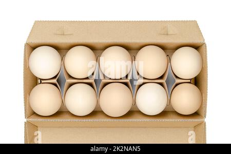 Fresh chicken eggs, raw hen eggs, in a cardboard container, from above Stock Photo