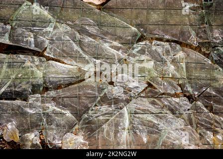 A texture from a broken pane of glass. Stock Photo