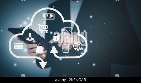 Cloud computing technology concept. Internet storage network system. Bigdata and business. Man wearing black suit and Finger touch tablet. Stock Photo