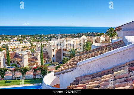 Marbella - the beautiful coastal city of Andalusia, Spain. The beach of beautiful city of Marbella, Andalusia, Spain. Stock Photo