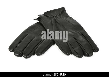 Casual leather gloves isolated on white background. Pair of gloves folded crosswise. High resolution photo. Full depth of field. Stock Photo