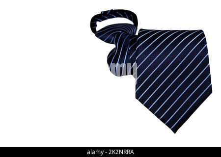 A navy blue striped male necktie isolated on white background with copyspace Stock Photo