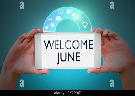 Writing displaying text Welcome June. Word Written on Calendar Sixth Month Second Quarter Thirty days Greetings Hands holding tablet presenting innovative ideas symbolizing technology. Stock Photo