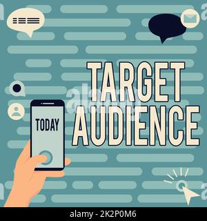 Text sign showing Target Audience. Concept meaning category of showing you want to address your words to Hands Holding Technological Device Pressing Application Button. Stock Photo