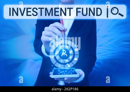 Text showing inspiration Investment Fund. Internet Concept A supply of capital belonging to numerous investors Lady Pressing Screen Of Mobile Phone Showing The Futuristic Technology Stock Photo