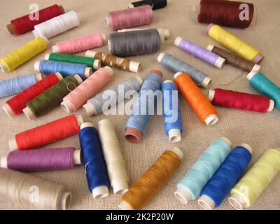 Sewing thread in different colors Stock Photo