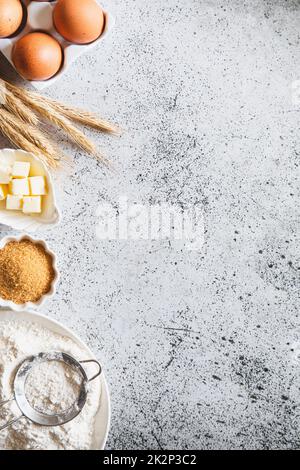 The Process Baking Cake In Kitchen - Dough Recipe Ingredients Eggs, Flour,  Milk, Butter, Sugar On Table From Above. Bake Sweet Cake Dessert Concept.  Top View. Stock Photo, Picture and Royalty Free