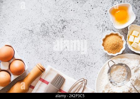 Baking or cooking ingredients, kitchen items for baking cakes. Kitchen  utensils, flour, eggs, almond, cinnamon, butter, sugar, rum. Pastry making  and Stock Photo - Alamy