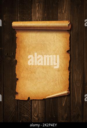 Old mediaeval paper sheet. Parchment scroll on a wood board Stock Photo