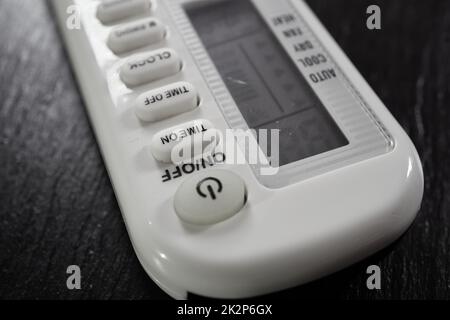 white remote control air conditioner Stock Photo