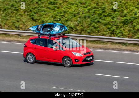 2011 Red FORD C-MAX ZETEC TDCI 1560cc Diesel 6 speed manual; travelling on the M6 motorway UK Stock Photo