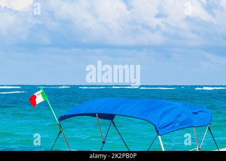 Waves boats caribbean coast and beach panorama view Tulum Mexico. Stock Photo