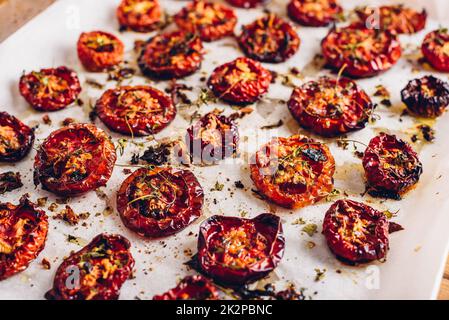 Sun Dried Tomatoes with Olive Oil, Garlic and Thyme Stock Photo