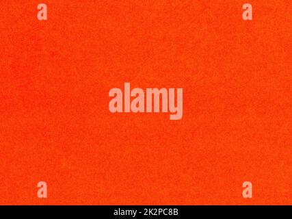 High quality scan of an fine grain fiber smooth uncoated paper texture red, bright, neon orange colored background with copy space for text material mock up for wallpapers Stock Photo