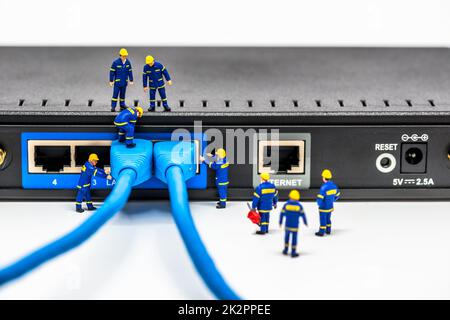 Group of engineers connecting fiber network cables Stock Photo