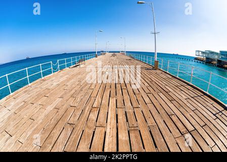 Wooden pier at Limassol's seafront promenade. Cyprus Stock Photo